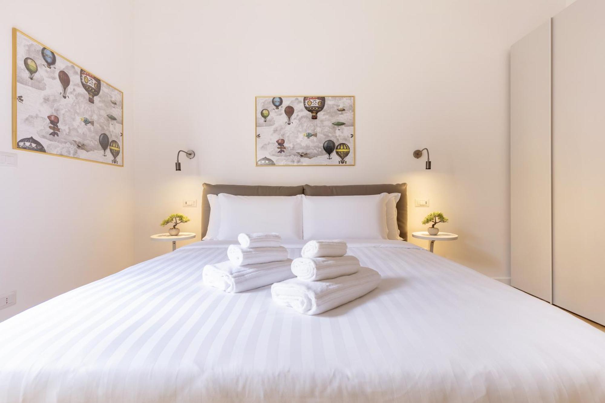Hostly-puccini Luxury Home-near Colosseum & Trevi Apartment Rome